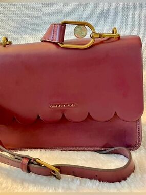 Charles & Keith Burgundy Scalloped Crossbody Bag with Gold Hardware